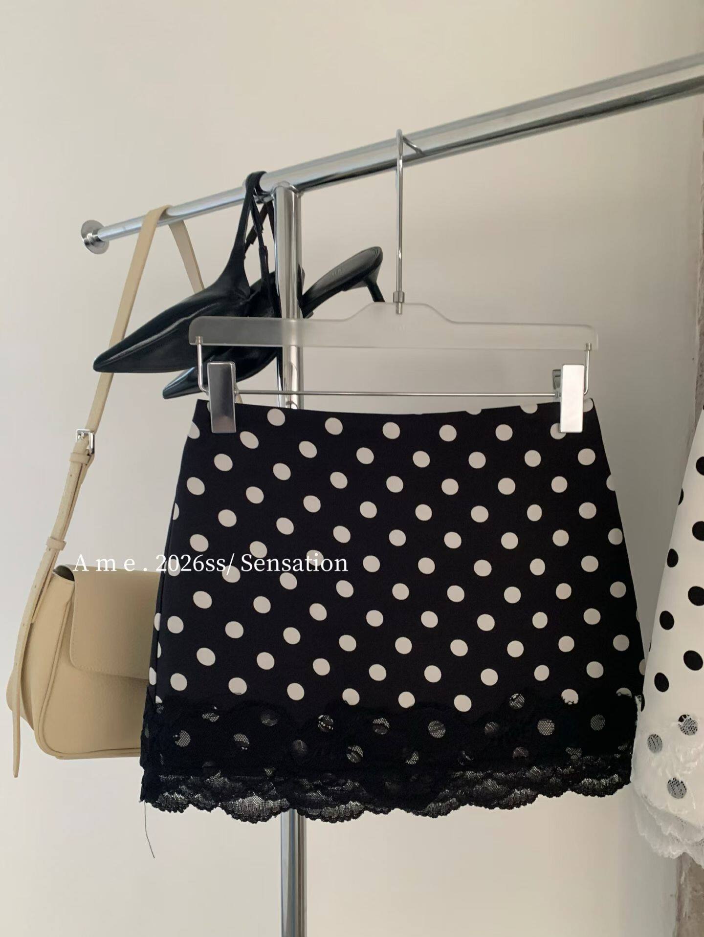 AME2026春夏新高品质波点蕾丝拼接半身裙女高腰显瘦包臀短裙A字裙