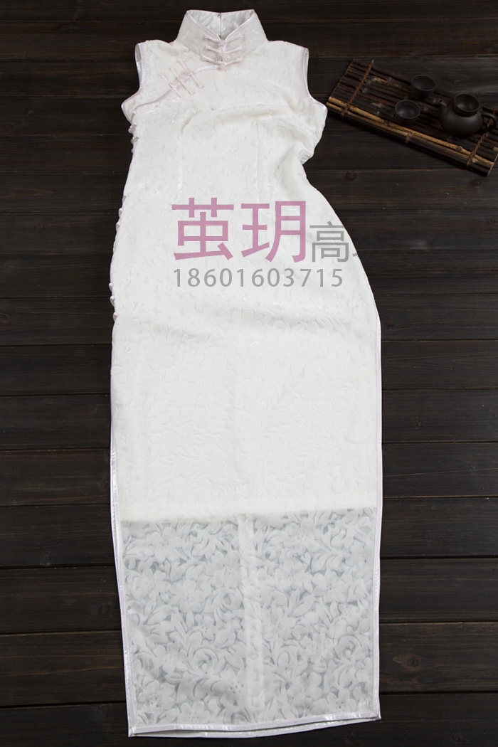 茧玥手工旗袍老上海高端定制店白色真丝烂花绒底部镂空改良长款