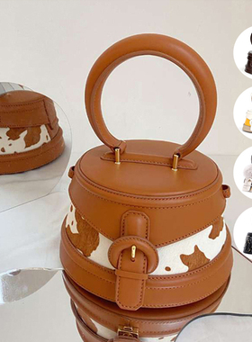 COCHAINS正品授权Nelo牛皮矮水桶包奶牛纹拼接轻奢小众手挽手拎包