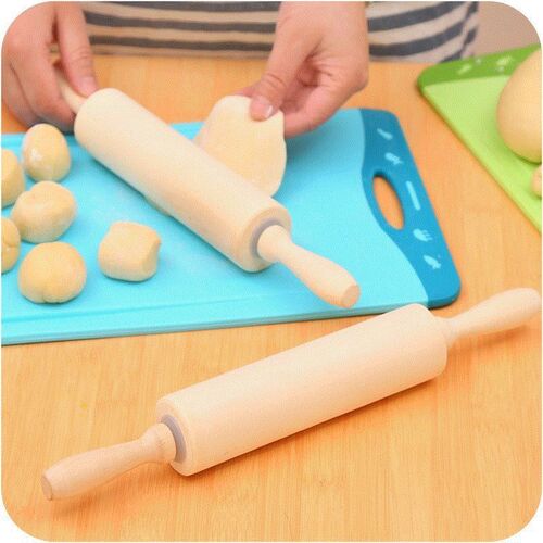 A large wooden roller rolling pin roll rod surface wooden