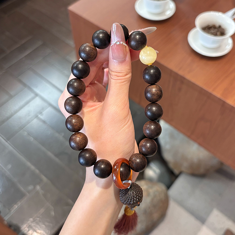 沉香单圈手串搭配蜜蜡如来佛像