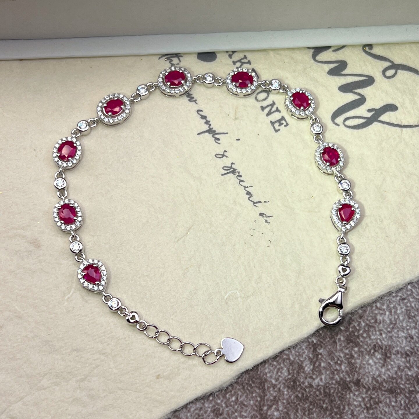 星赞S925纯银镀金约0.4克拉天然缅甸红宝石椭圆水滴形手链轻奢