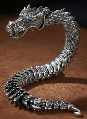 Shang Dragons Hand Chain is a big black dragon snake in a