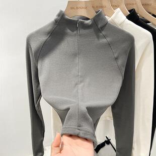 A half-coloured, velvet, undershirt girl with long sleeves i
