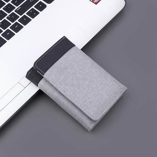 A short canvas wallet for a man with 30% of a cowboys money