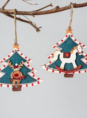 A Santa snowmans moose with a Christmas wooden door and a C