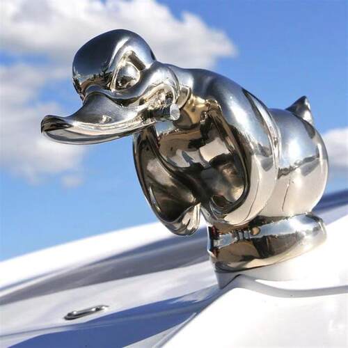The resin-based car is heavily decorated duck with an electr