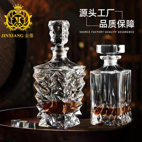 The golden statue with a thick and creative bottle of whiske