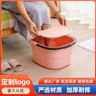 Home rubbing buckets with plastic pellets wash their feet ov