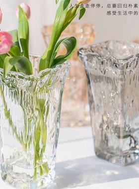 A Spanish vase with a glass plug in an inside-winded and tra