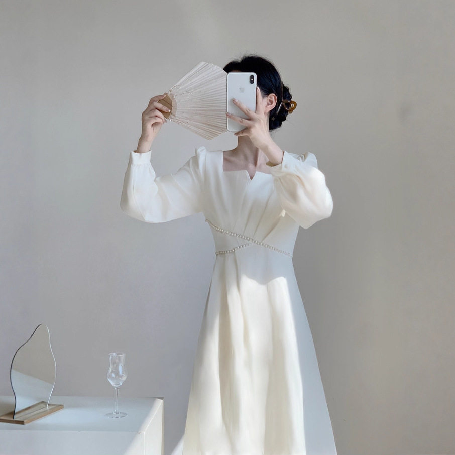 2025秋冬装新款姐妹女装不规则长裙显瘦长袖度假碎花连衣裙小V领