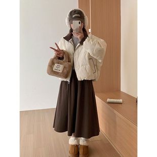 国际一线品牌羽绒服2025冬季羽绒服女针织拼接短款立领加厚保暖白