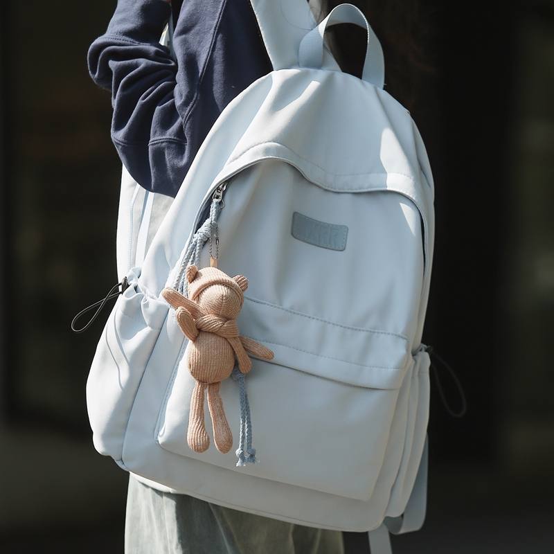 书包女大学生简约纯色2025新款女生大容量背包帆布双肩包初中生男