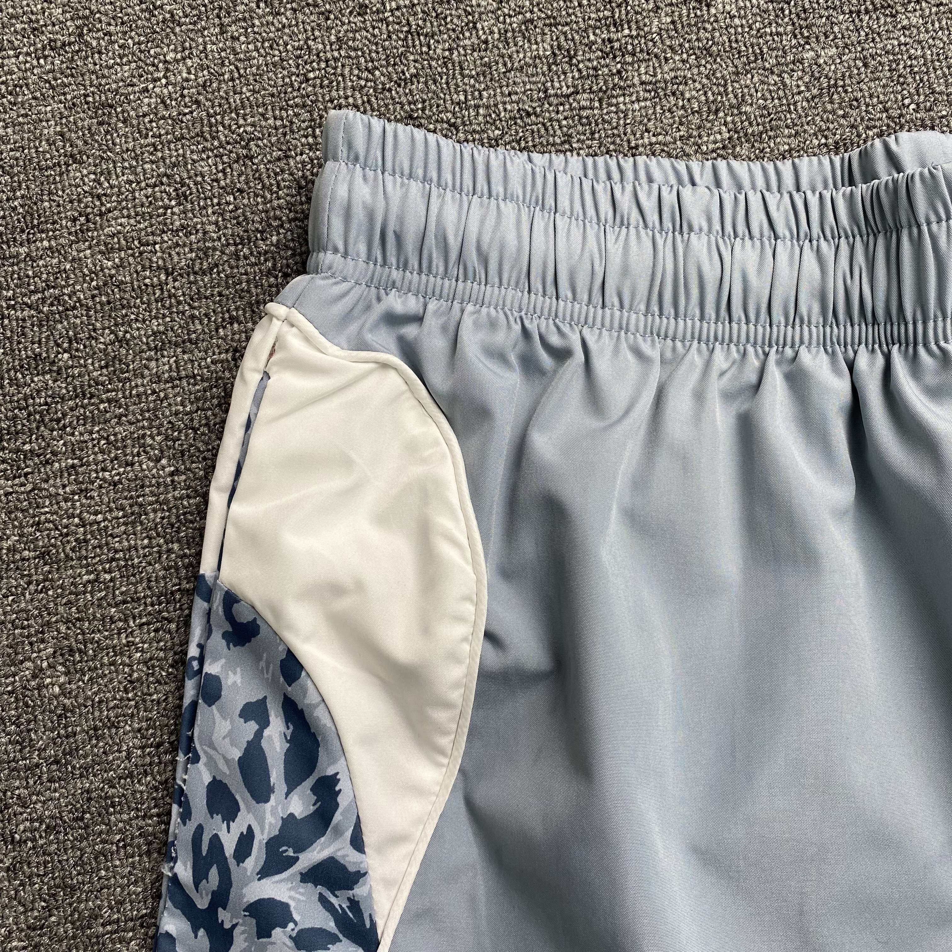 thumbnail for Leopard print logo print is a casual and simple sports short