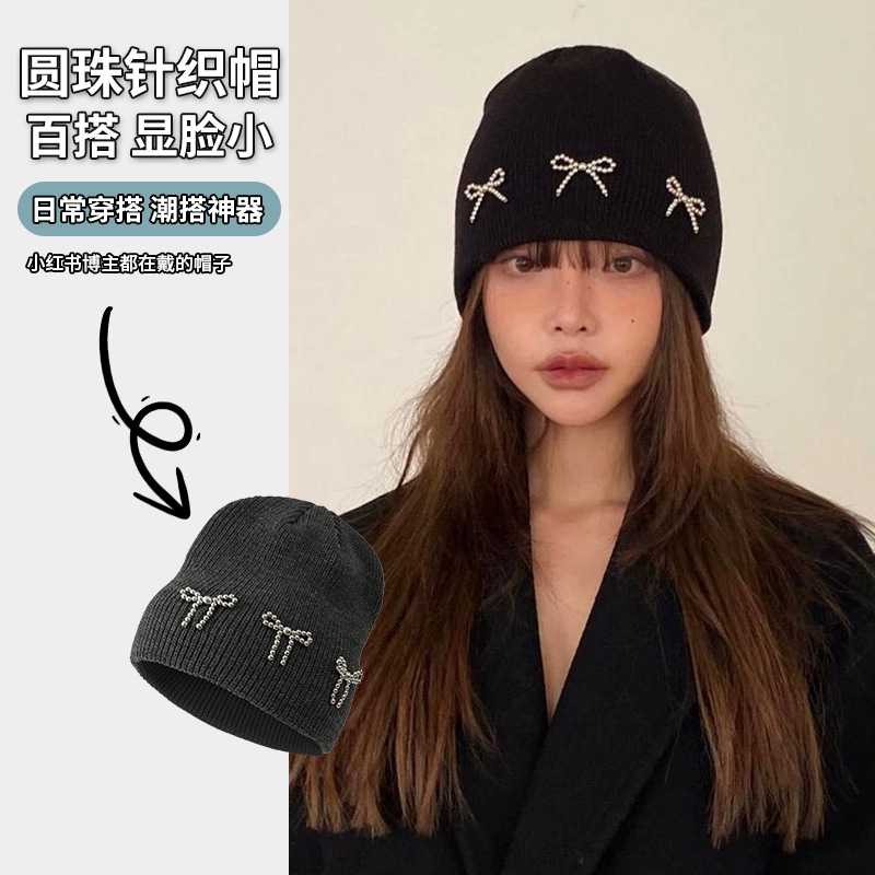 韩版设计师款珍珠蝴蝶结针织帽女