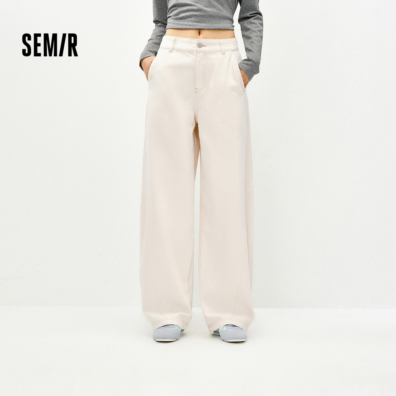 森马白色分割弯刀拖地牛仔裤女