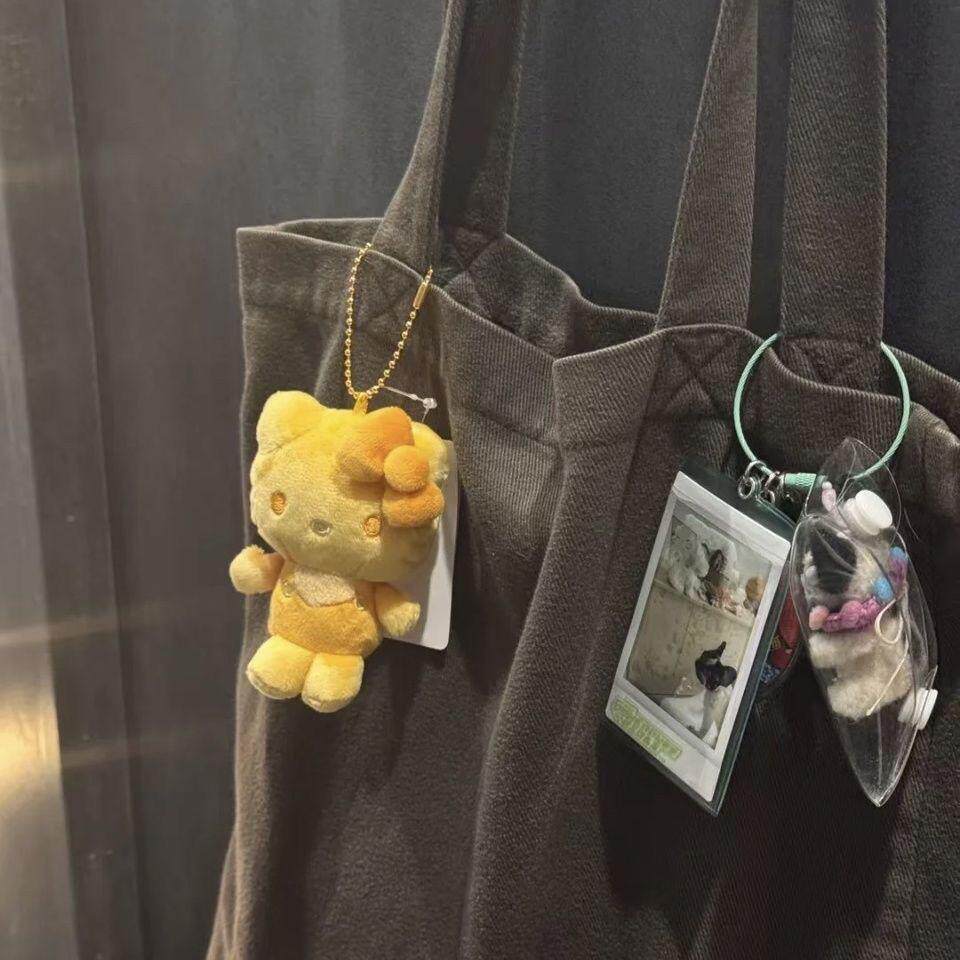 彩虹系列黄色kitty公仔书包挂件包包小挂饰品可爱卡通女生kt玩偶图片