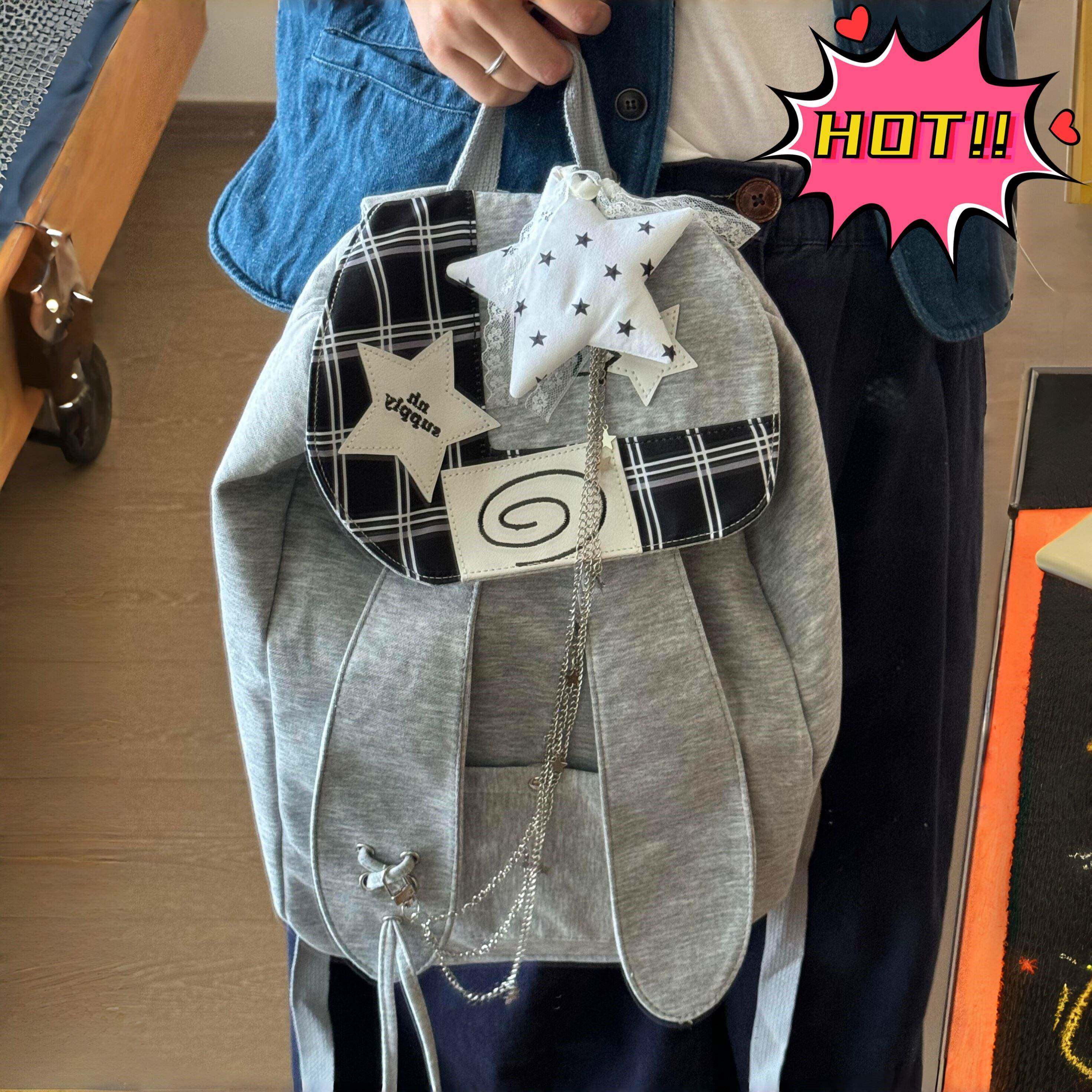 兔子耳朵双肩包日常高级感通勤背包初中生上课大容量翻盖束口书包