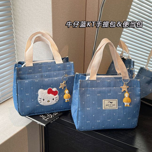 新款卡通可爱kitty猫收纳包女大容量休闲牛仔布手提包通勤便当包