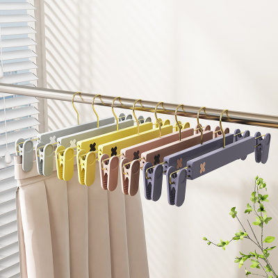 金钩x拼色伸缩磨砂裤架塑料裤夹