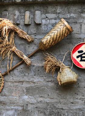 竹箩稻草古旧物件农具挂饰渔家鱼米之乡景区装饰餐厅农庄农家墙饰