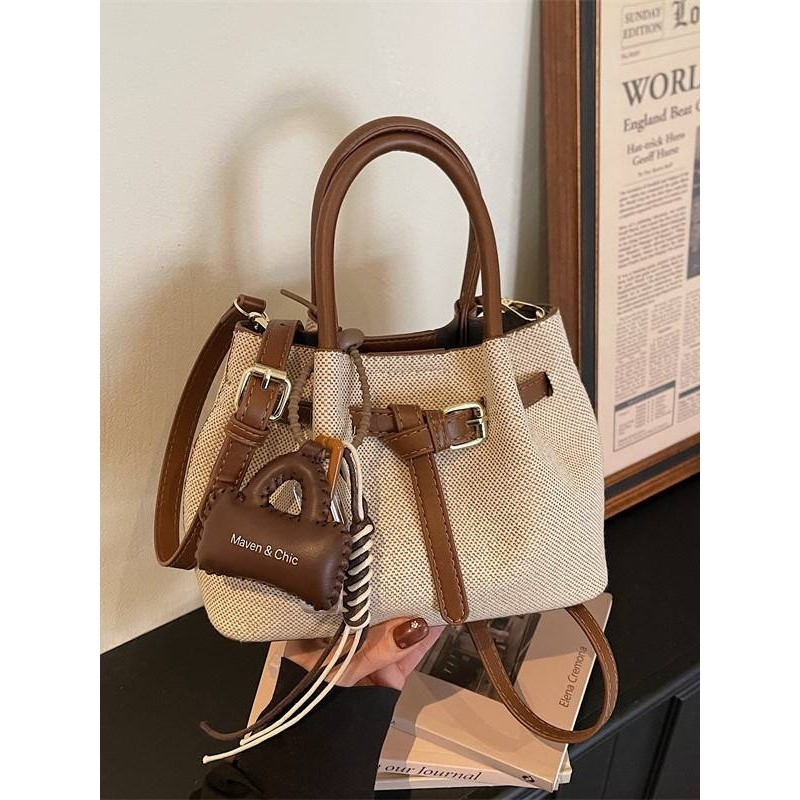 专柜品牌秋冬复古手提水桶小包包流行单肩包2025新款时尚百搭通勤,箱包皮具/热销女包/男包,水桶包,淘宝优惠券,粉丝福利购,淘宝优惠卷