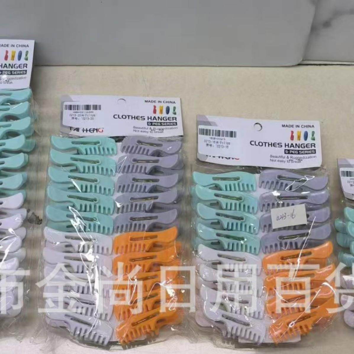 Multiple small plastic clips with a storage basket for cloth