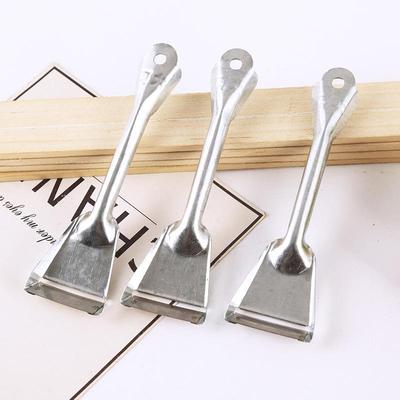 Vintage rust-resistant metal peeler, fruit and vegetable pee