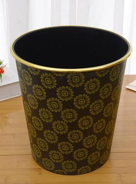 Manufacturer supplies black trash bins with gold trim, plast
