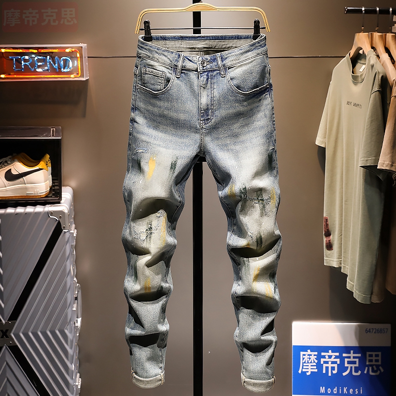 泼墨油漆破洞牛仔裤男士韩版黄泥