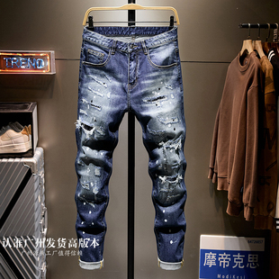 乞丐破洞九分牛仔裤男款潮牌蓝色泼墨秋冬修身补丁百搭长裤子2026