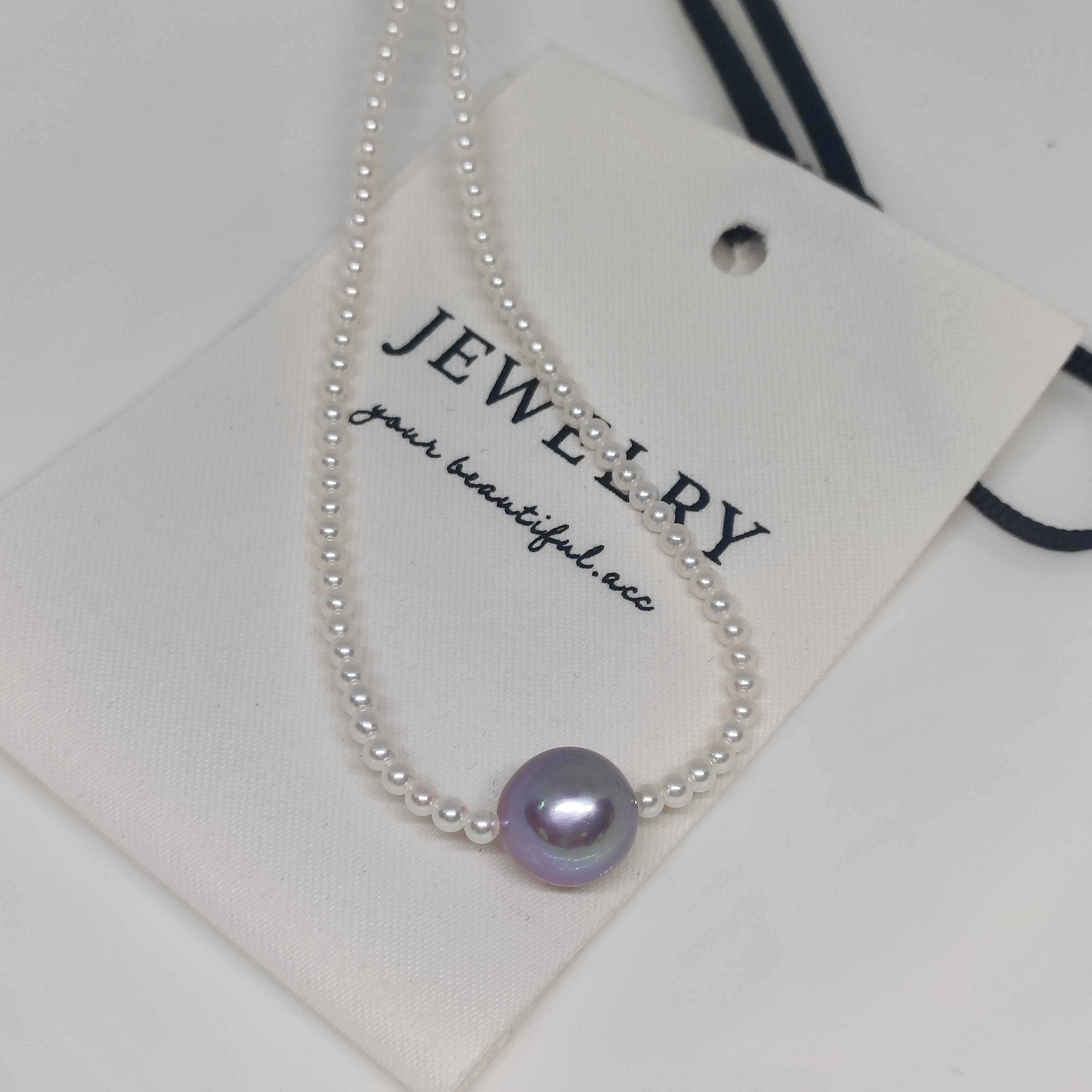 2.5+mm正圆极光天然淡水珍珠配10mm+紫或白近正圆珍珠路路通项链
