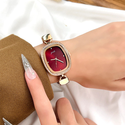 GEDI个性创意女士皮带表圆形复古气质女表简约百搭学生表款