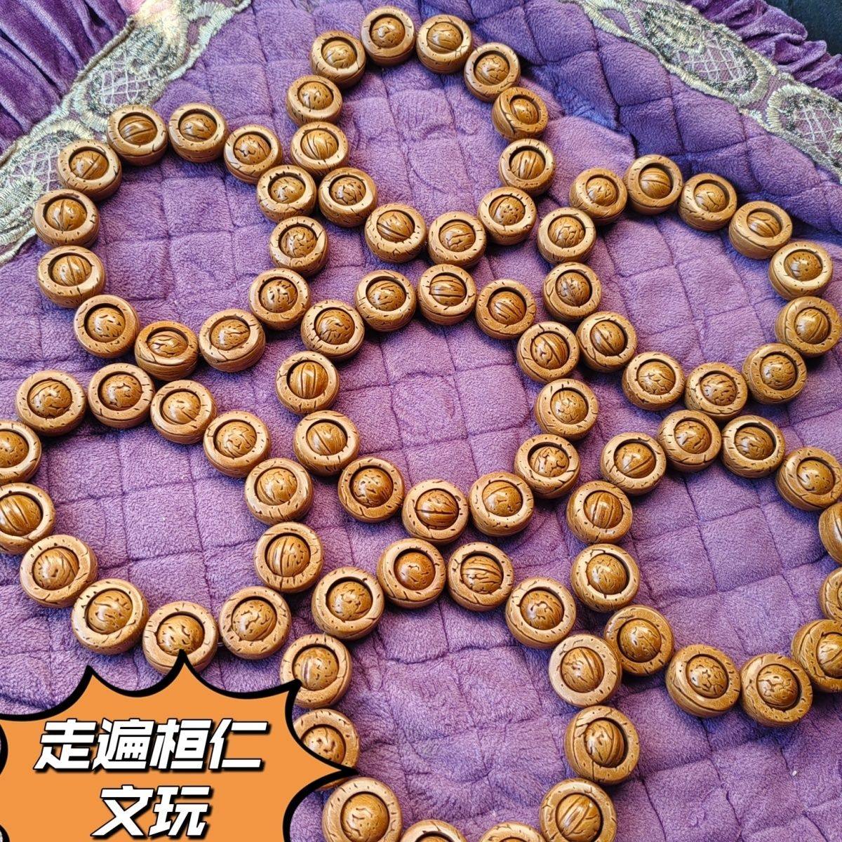 东北桃核转运珠外圈19.5内珠13左右 12颗籽。 外圈21左右内珠13.5