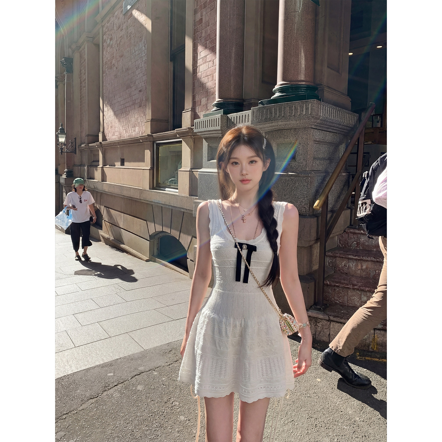 专柜正品法式白色无袖背心连衣裙女2026夏新款蝴蝶结收腰a字短裙