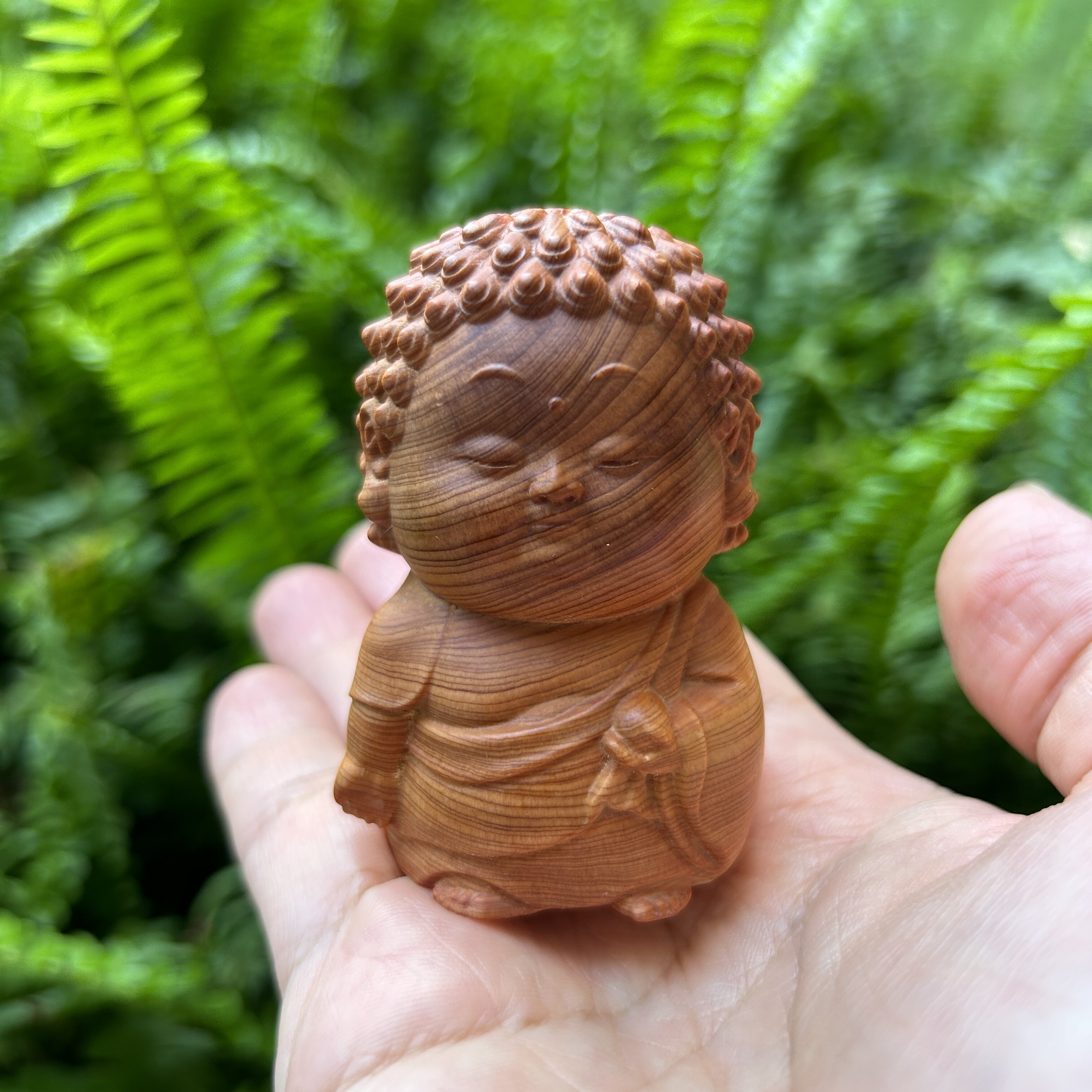 天然陈化老料崖柏木雕刻宝宝佛如来佛祖手把件可爱佛像文玩小摆件图片