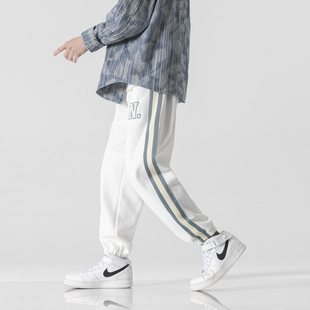 春秋休闲裤宽松束脚长裤青少年灯笼裤学生小脚卫裤条纹哈伦裤男裤