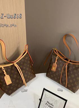 香港UK2024新款复古老花托特包大容量机场包个性设计师宽带单肩包