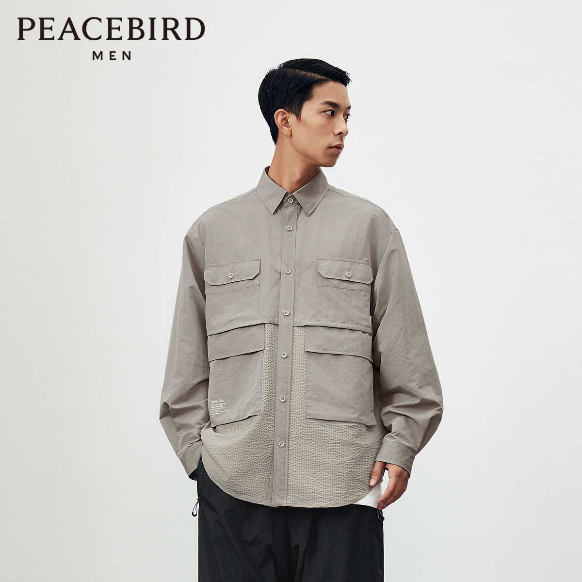 太平鸟男装 潮流泡泡纱拼接工装长袖衬衫男B2CHE1346