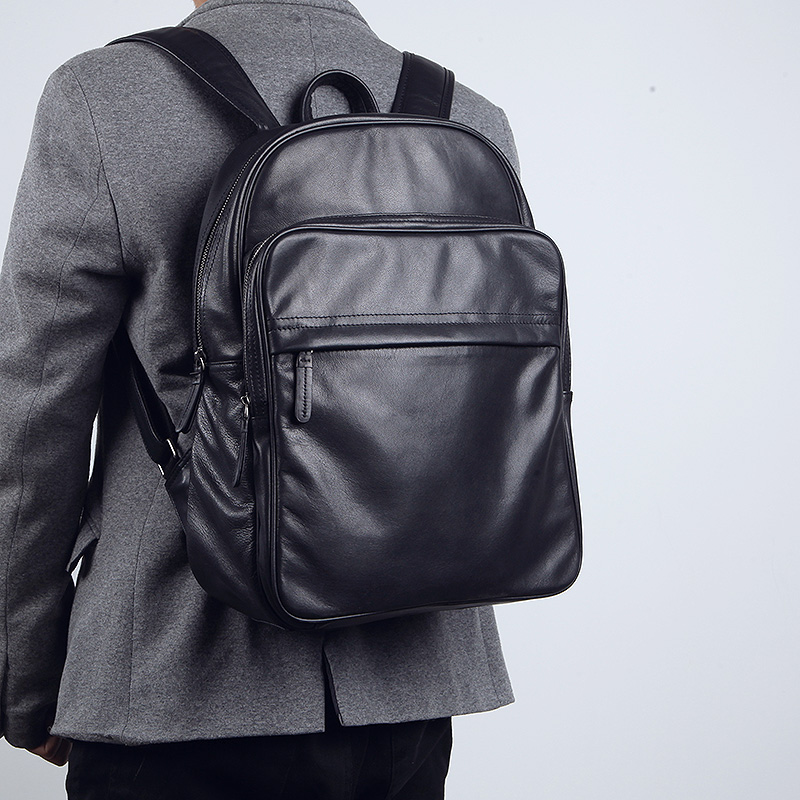 皮具时尚潮流休闲商务黑色双肩包