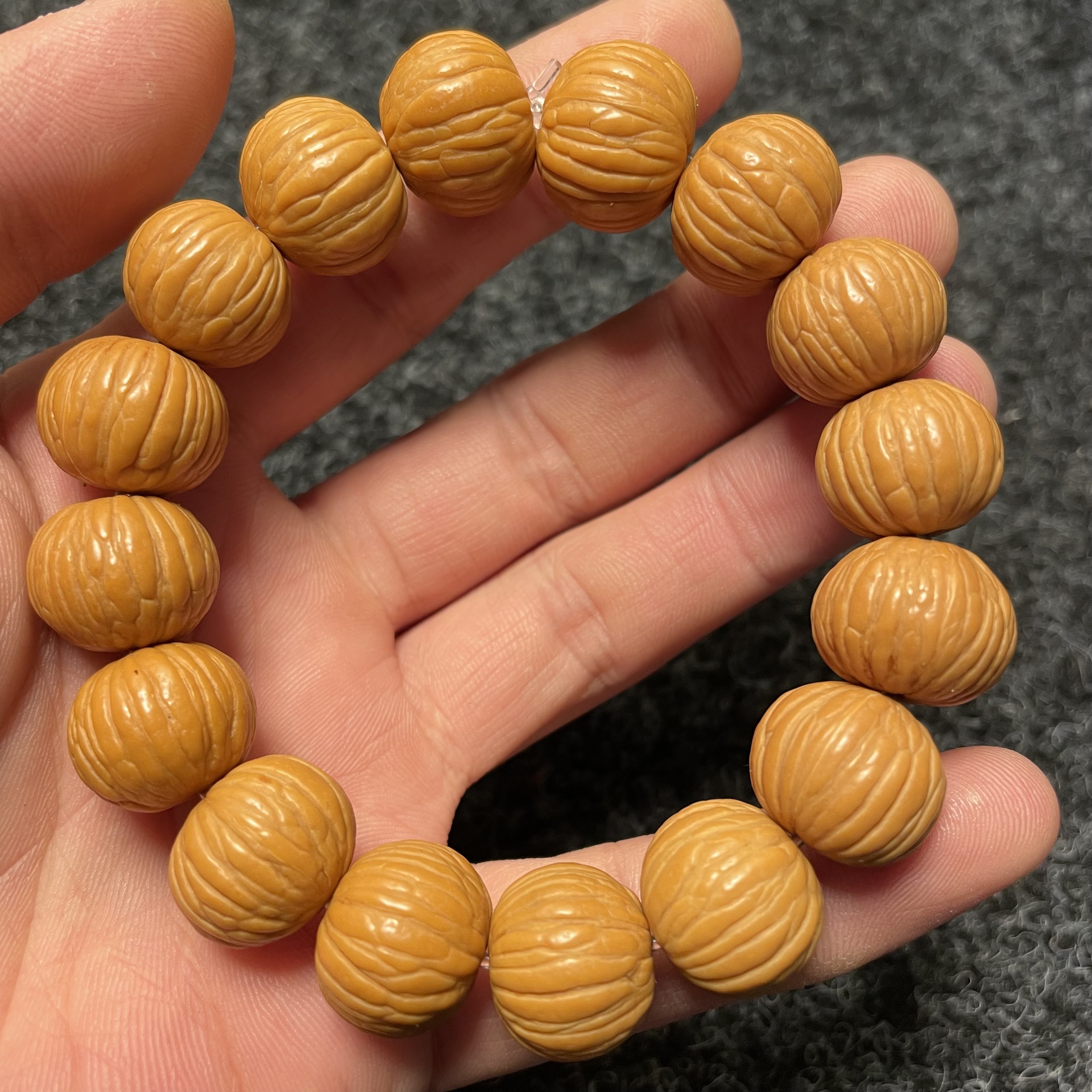 西瓜纹黄金猴头手串特价批发