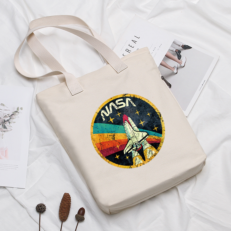 nasa单肩帆布包包大学生上课用大容量手提袋子女文艺复古厚宇航员