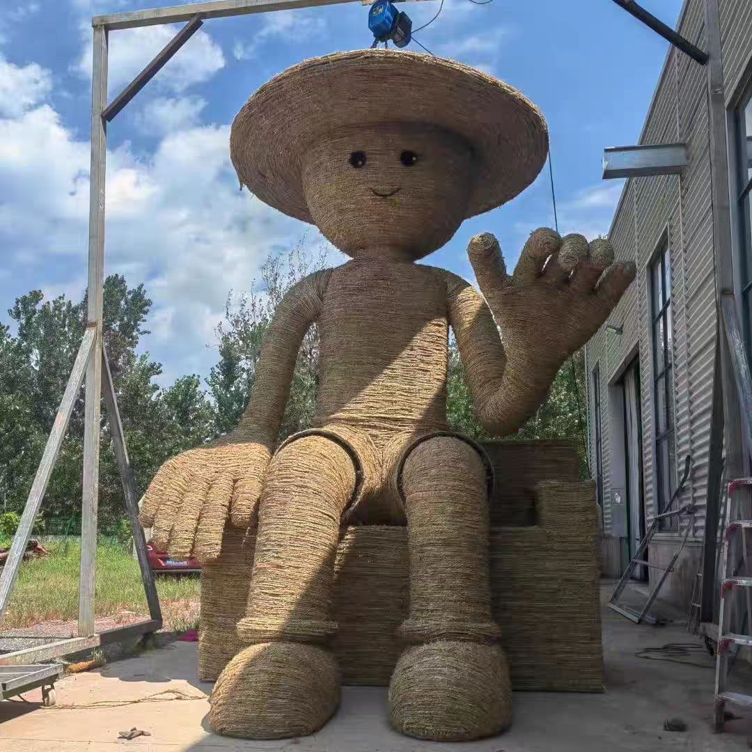 稻草工艺品制作丰收节粮仓大型农耕卡通人物草编艺术造型景观摆件