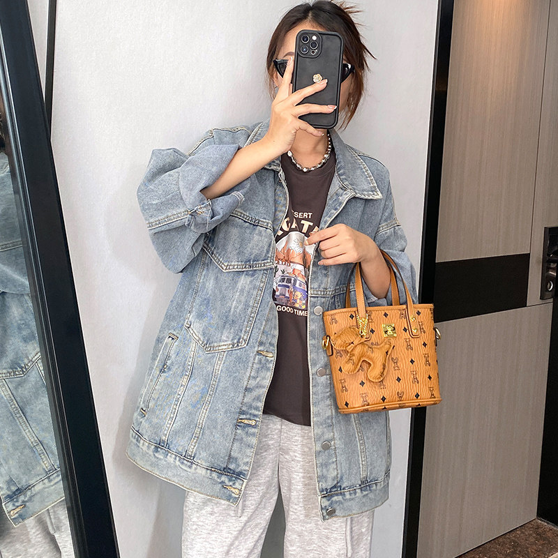 香港真皮菜篮子包女2026新款潮时尚小众手提水桶包百搭单肩斜挎包