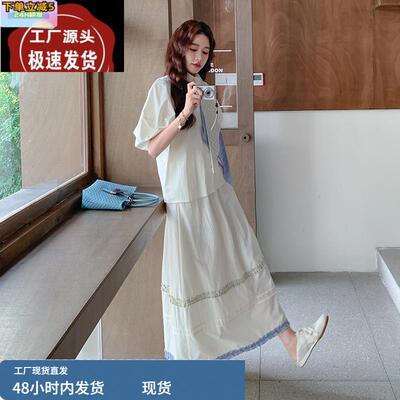 米杏色套装女2025年夏季新款法式清冷松弛感V领上衣半身裙两件套