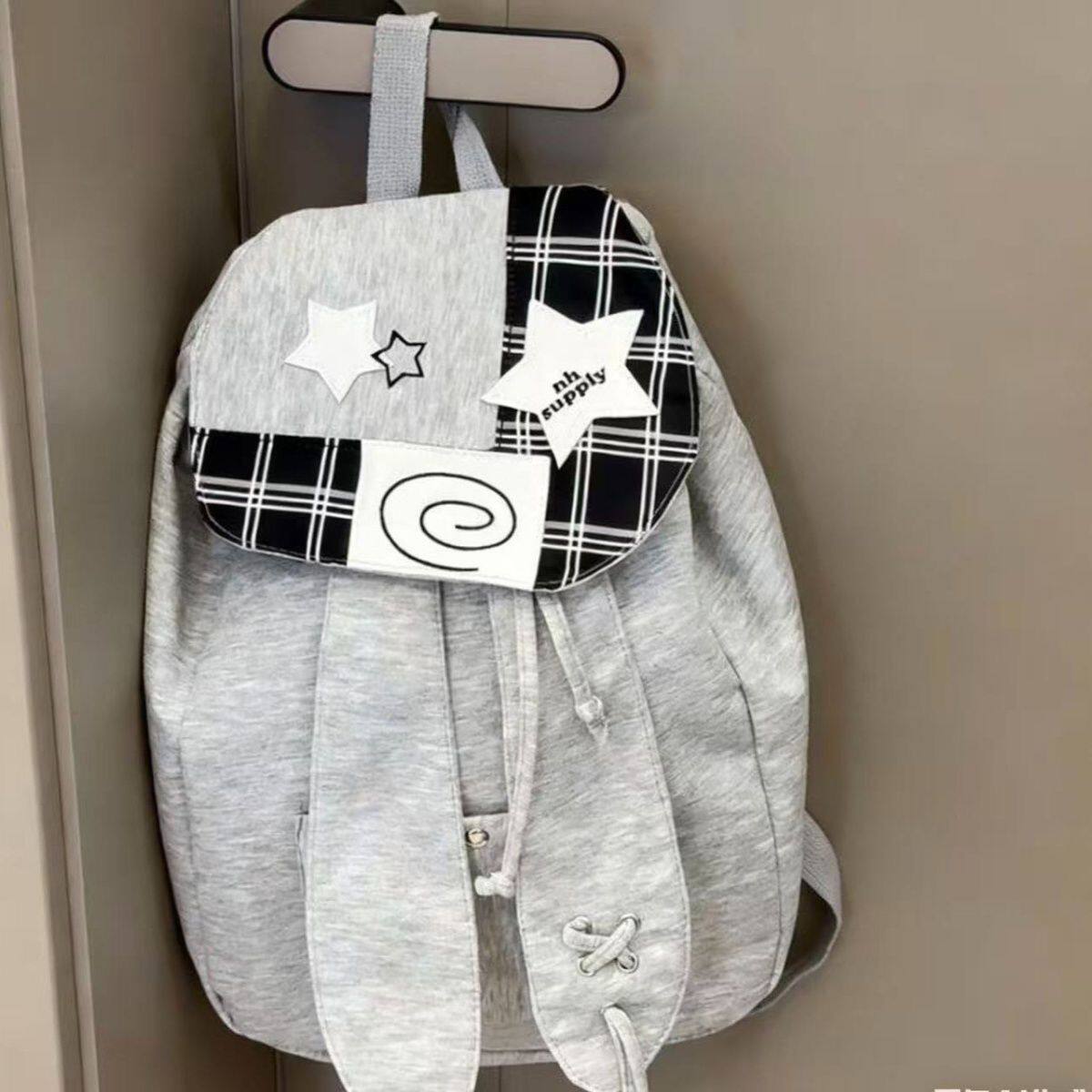 新款高颜值兔子耳朵书包百搭星星拼接双肩包束口背包大容量通勤