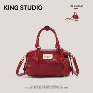 红色手提包包女2026新款百搭可爱枕头包高级感小众通勤单肩斜挎包