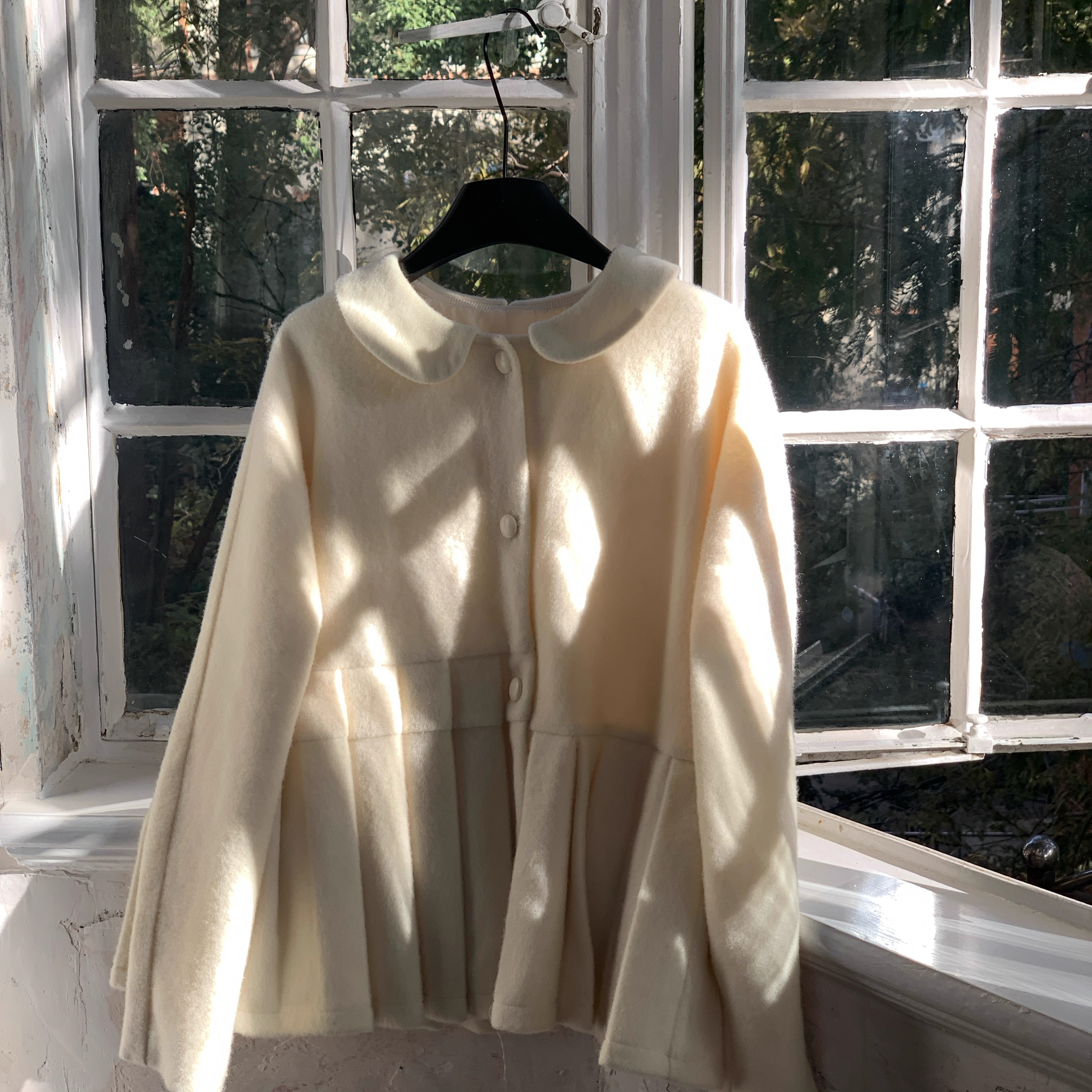 岛知道秋冬《绘空事》全羊毛娃娃衫百褶大衣日系少女感乳白外套