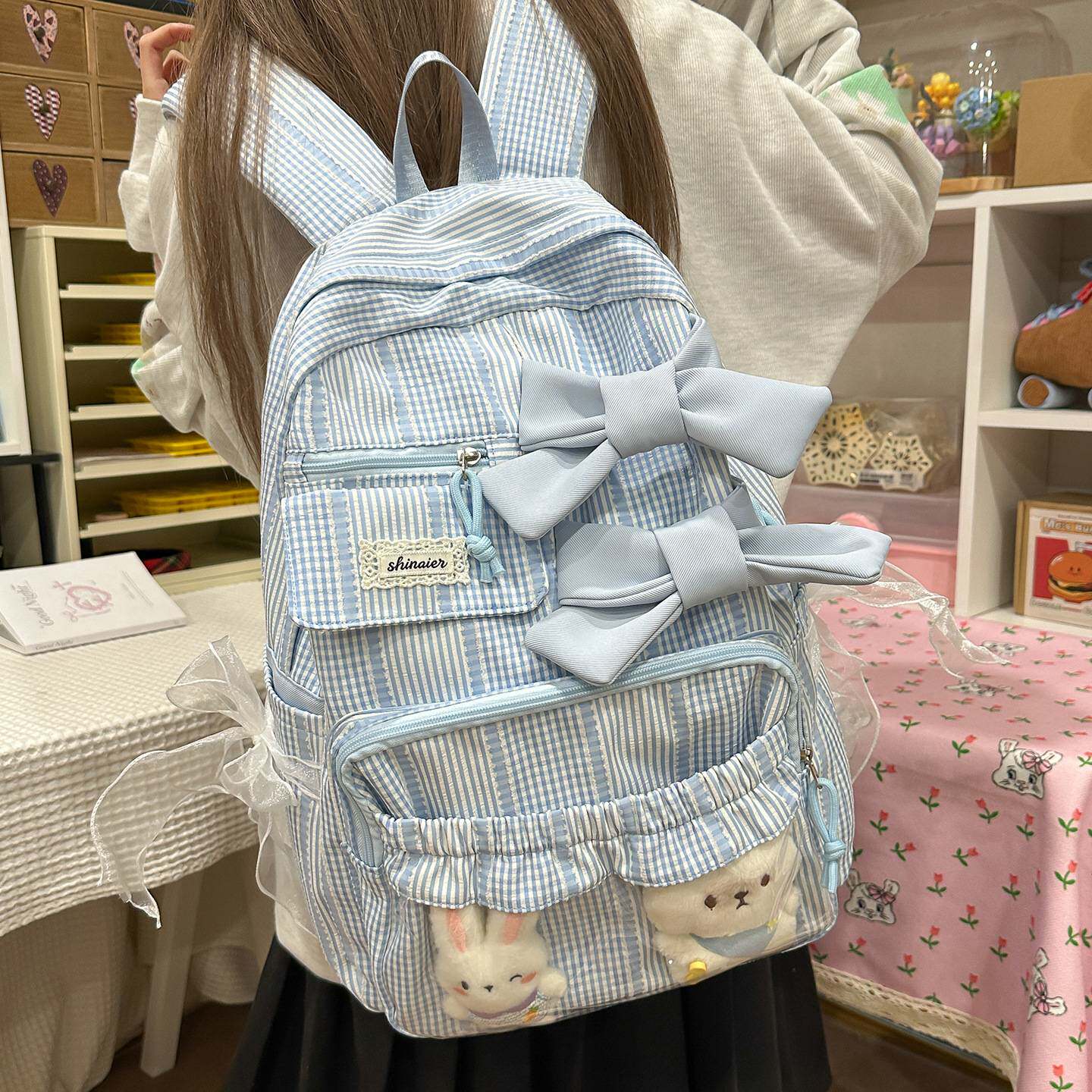 官方正品新款时尚小学生书包女初中生高颜值ins条纹蝴蝶结双肩包