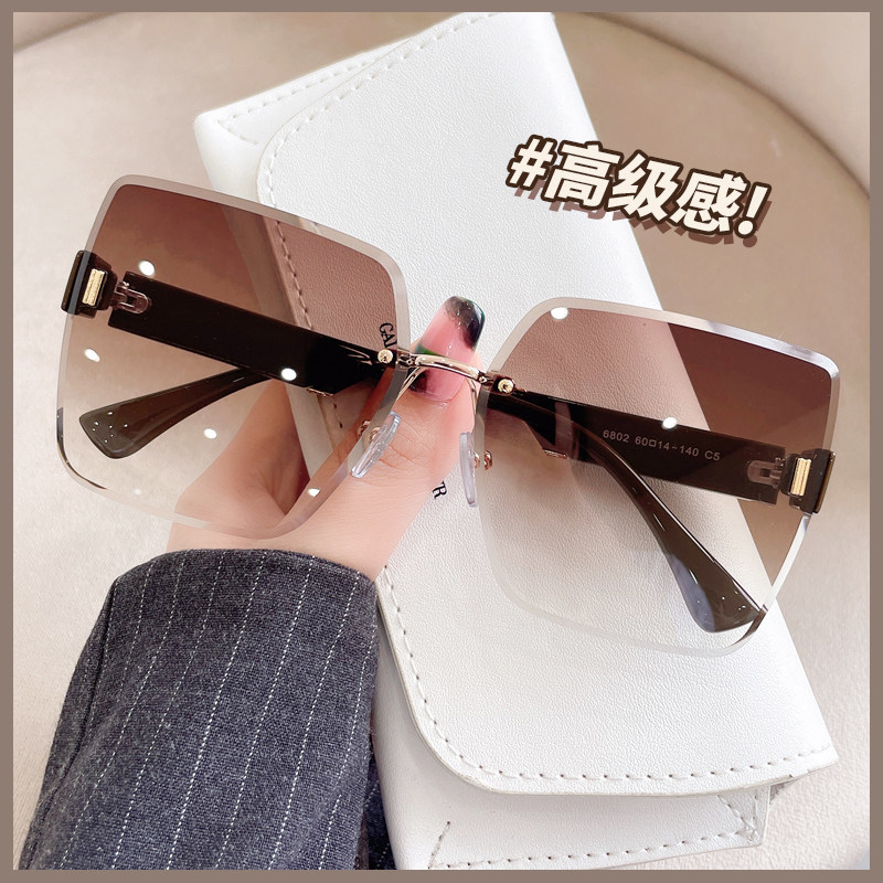 茶色墨镜女士高级感2025年新款无框夏季防晒太阳眼镜防紫外线强光